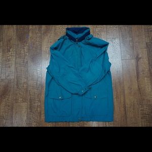 an emerald Totes "rain jacket"